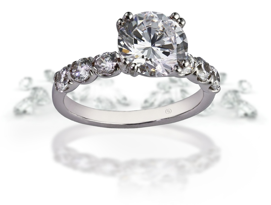 A custom diamond ring with a white background.